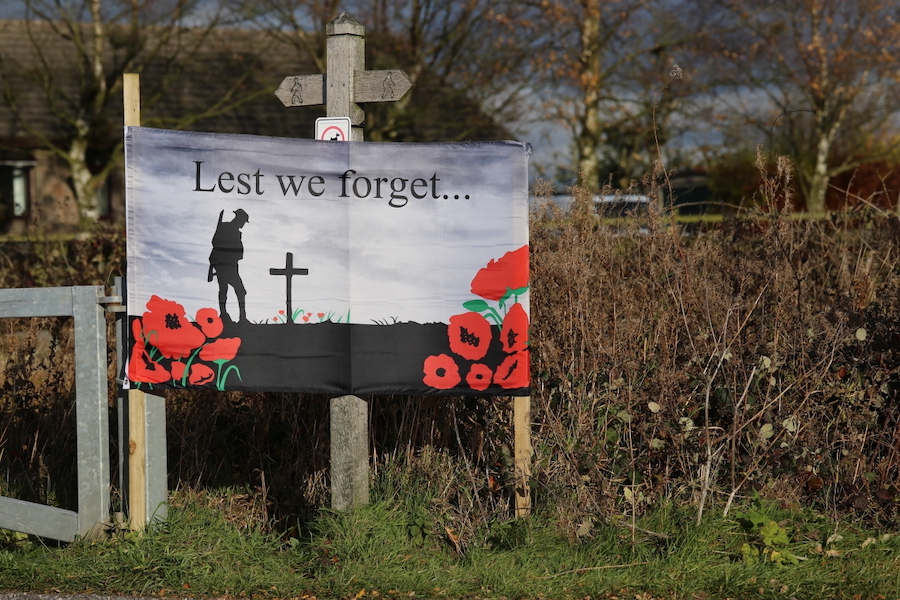 Photo of "lest we forget" banner commemorating centenary of armistice day November 2018  