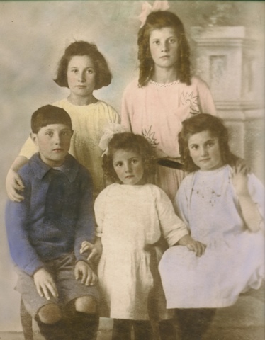 Colourised photo formal group of five young children early 1920s