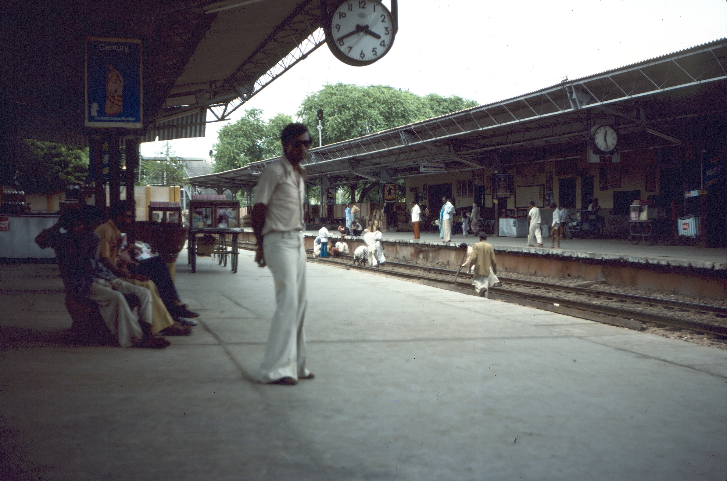 Workmen on tracks replacing rails