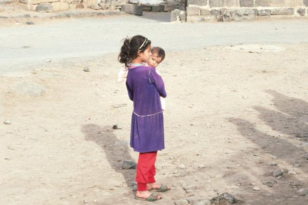 Child and baby in Bosra